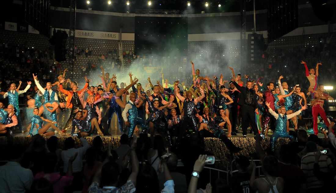 Dancers celebrate on stage at the World Salsa Festival in Cali